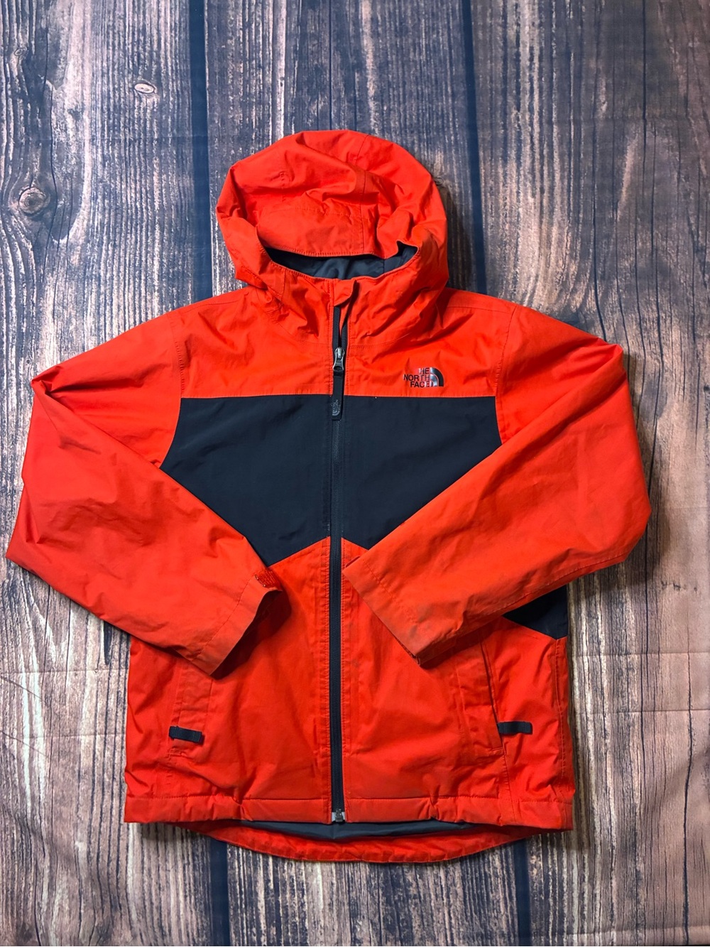 The North Face Orange and black Kids' Hooded Rain Jacket size M